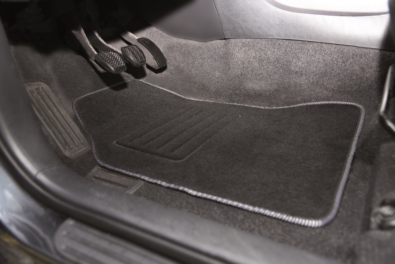 Velourteppich im Auto